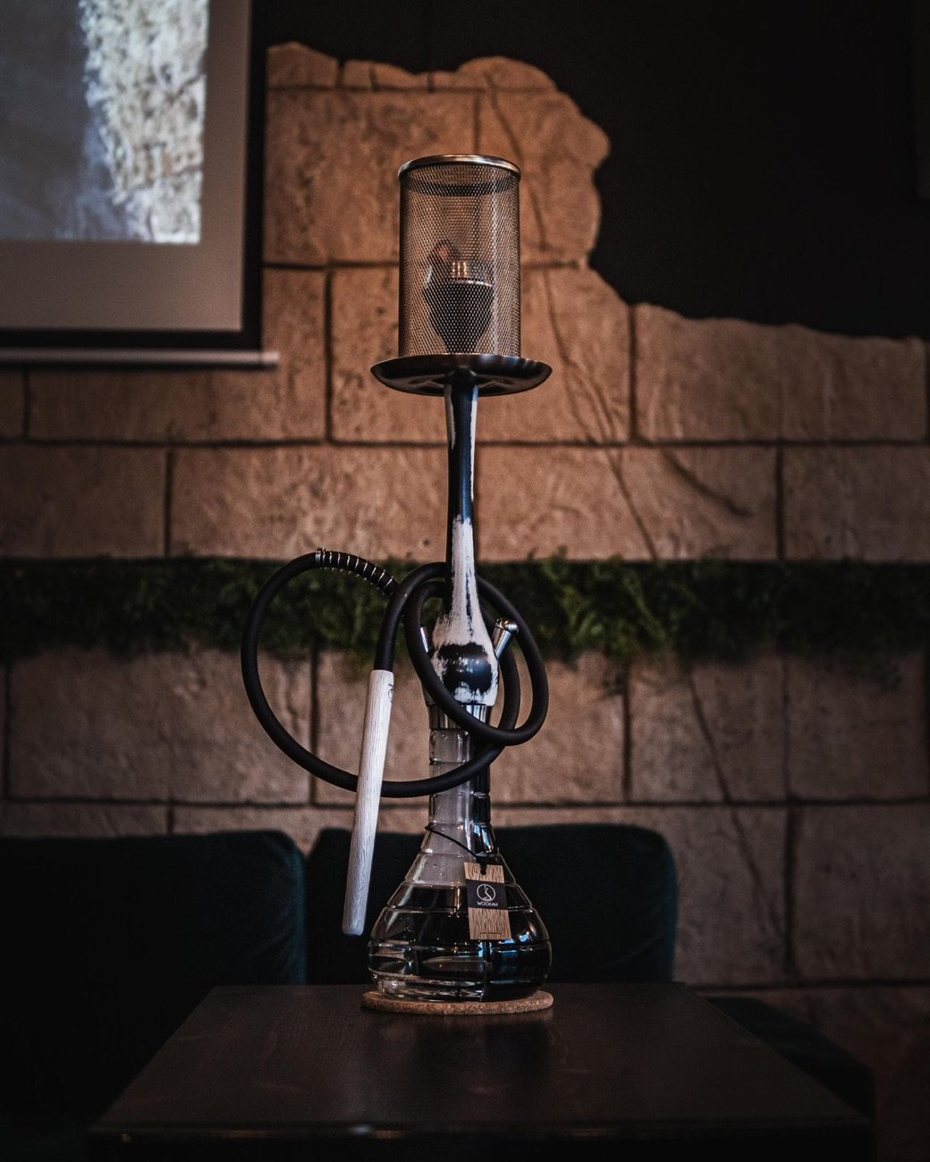 Clear-glass Wookah hookah on the table